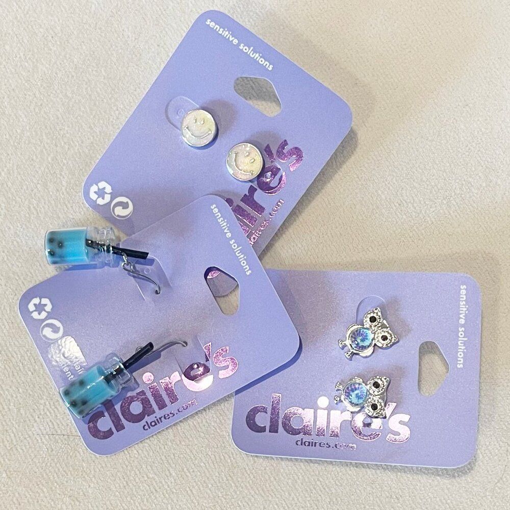 Claire's girls earrings set of 3 smiley faces, boba tea and owls.